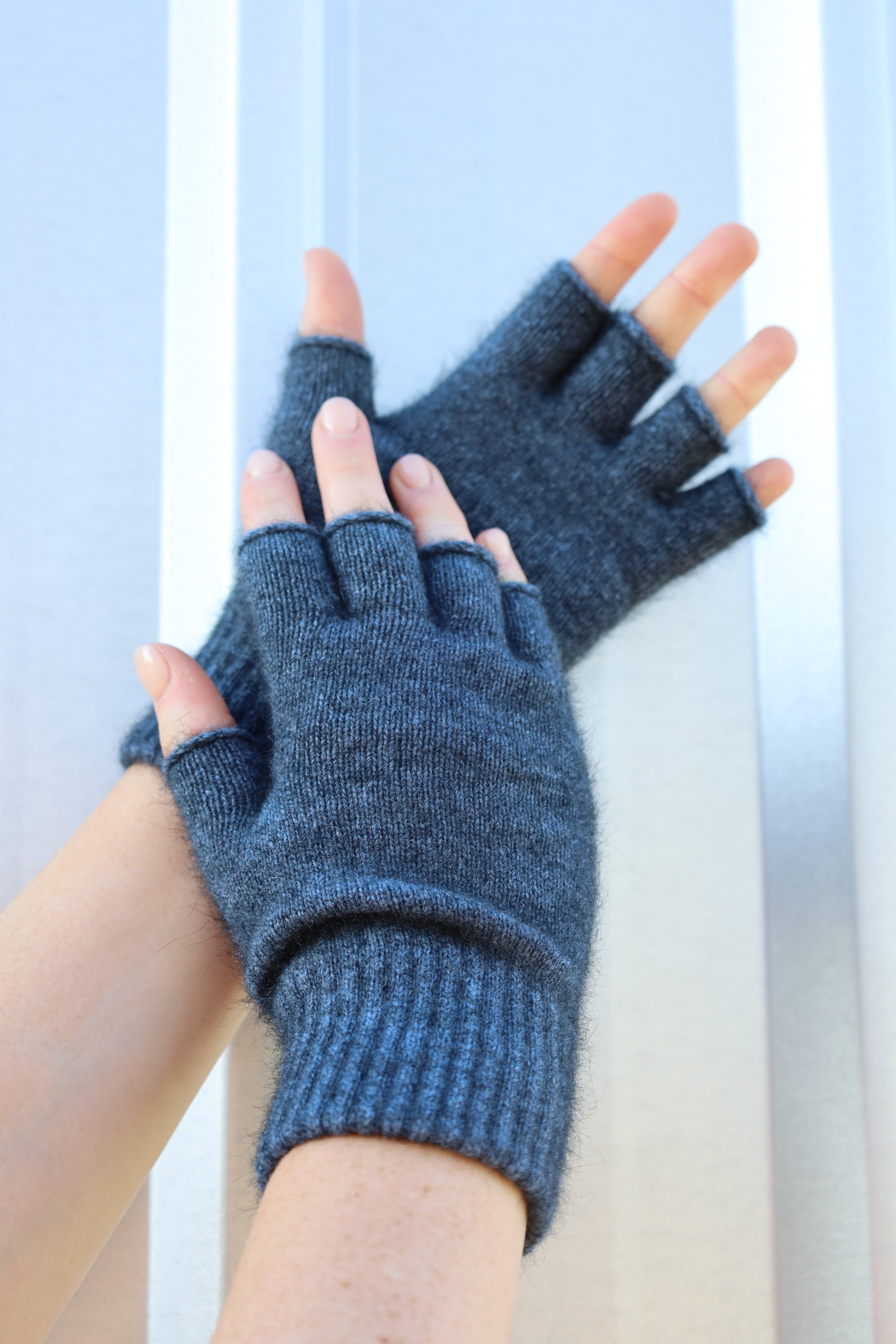 Neptune  fingerless gloves worn on a neutral background