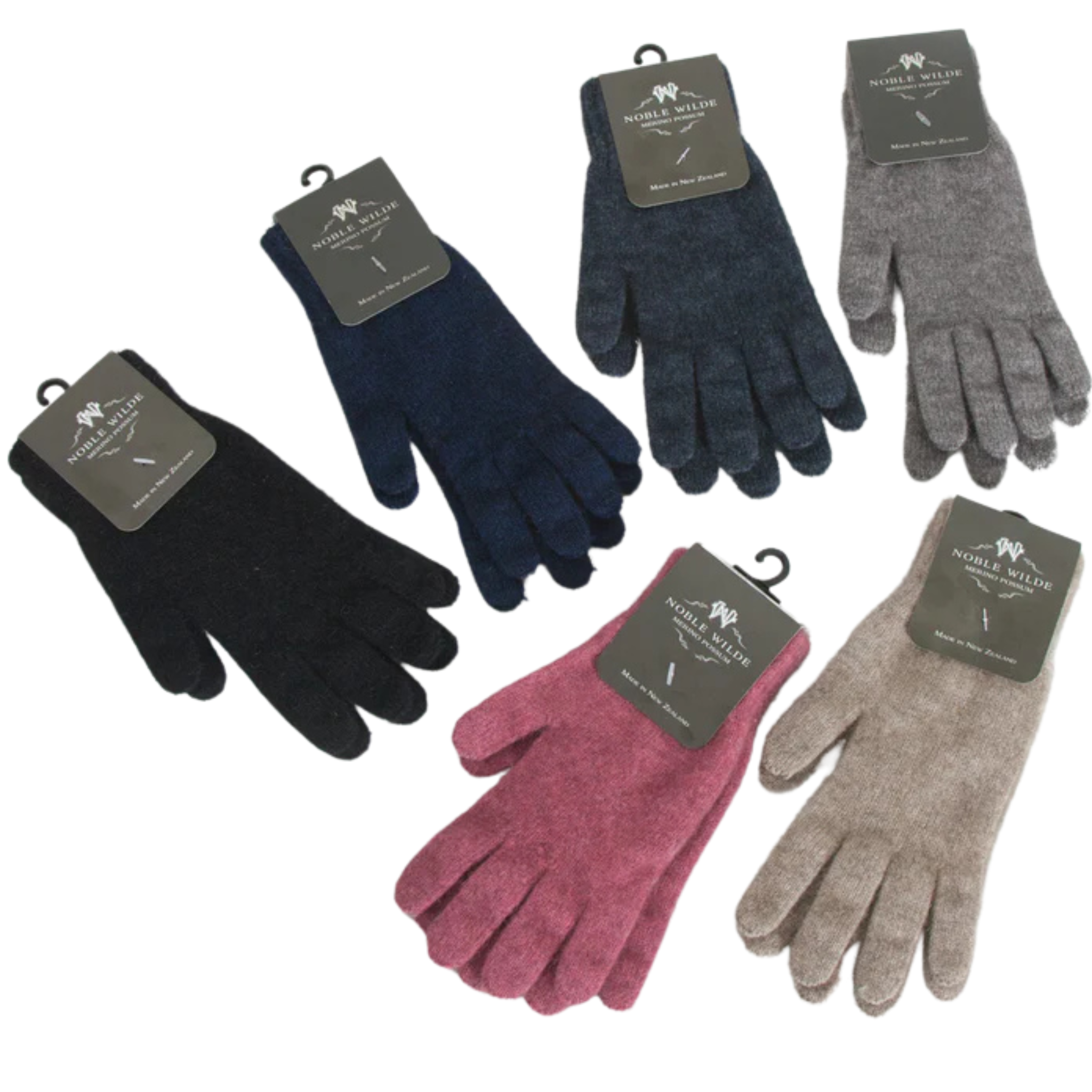 A selection of Merino Possum Gloves in various colors displayed with their tags attached.