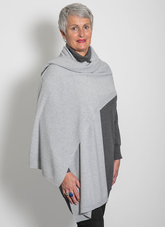  Scoring excellence in warmth and style is this gorgeous 100% Supersoft Fine Merino wrap from AOK Clothing.
